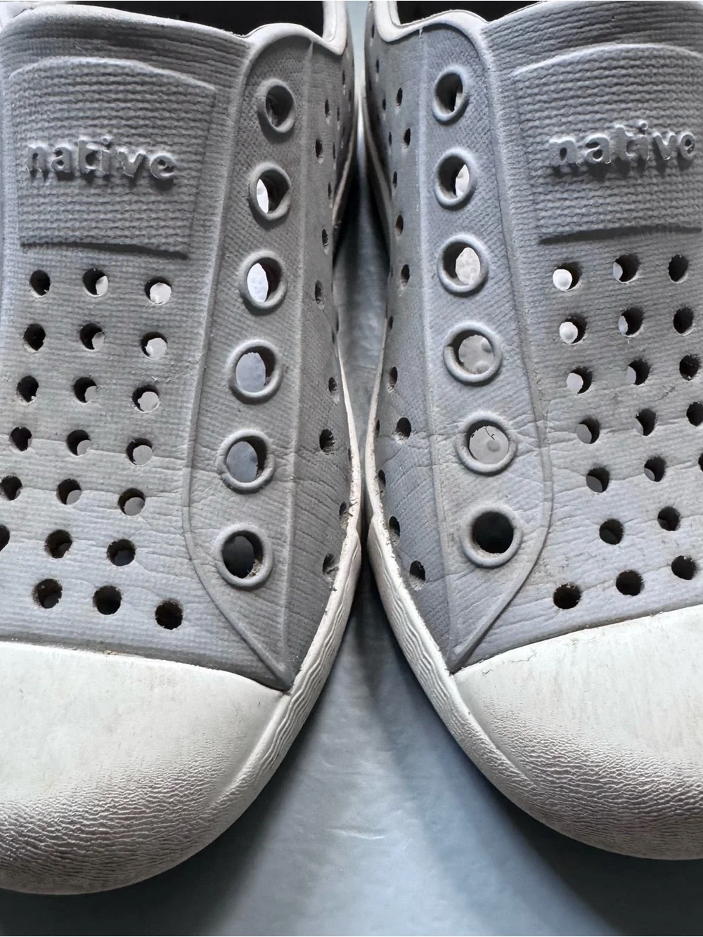Native Grey Slip-On Sneakers with White Toe Cap